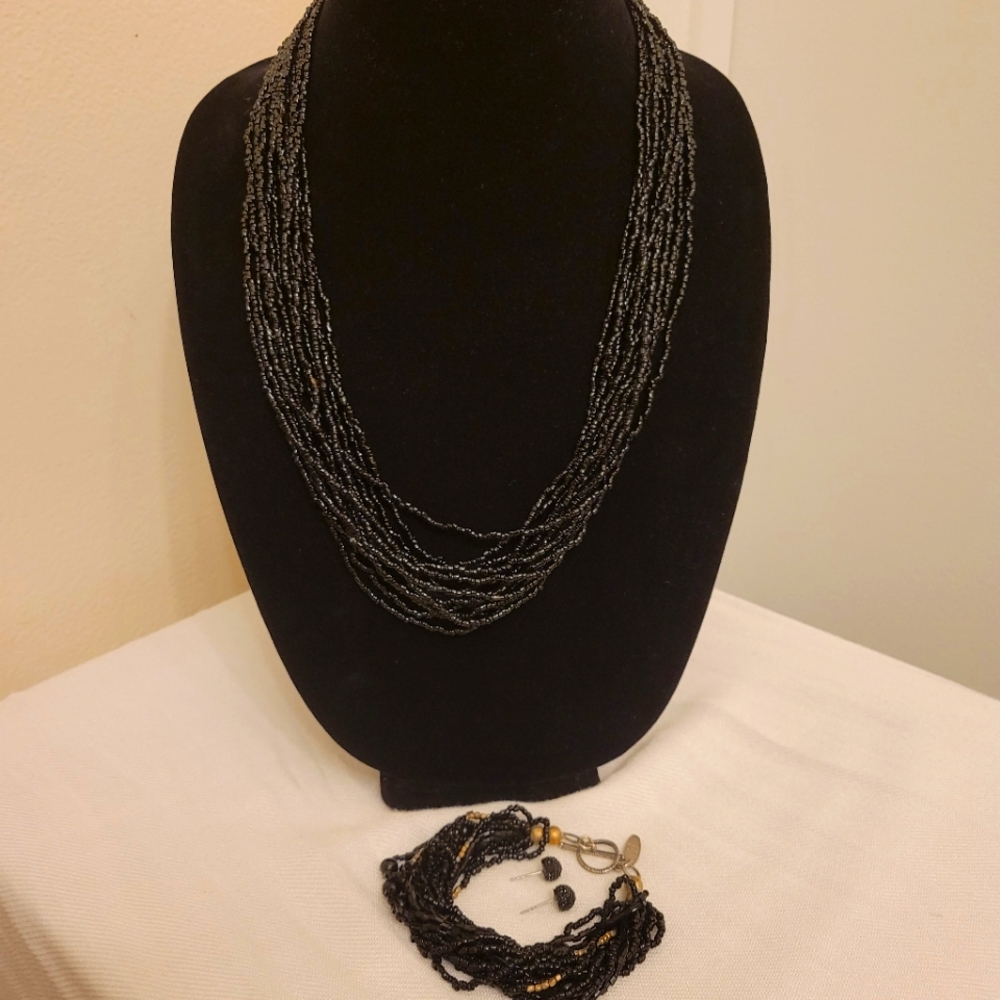 Necklace, earrings, and bracelet
